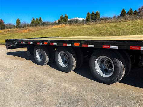 3 axle gooseneck flatbed with steel box on front|gooseneck trailer jacks.